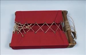 Eddie Bauer patented badminton shuttlecock artifact, red fabric with bamboo frame and goose quills
