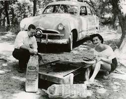 Kingsford branding with 1950s couple and Ford automobile